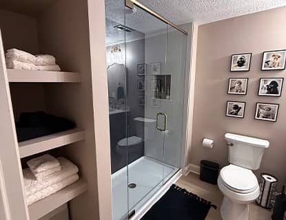 Full basement bathroom with tub and shower in Plain City, OH